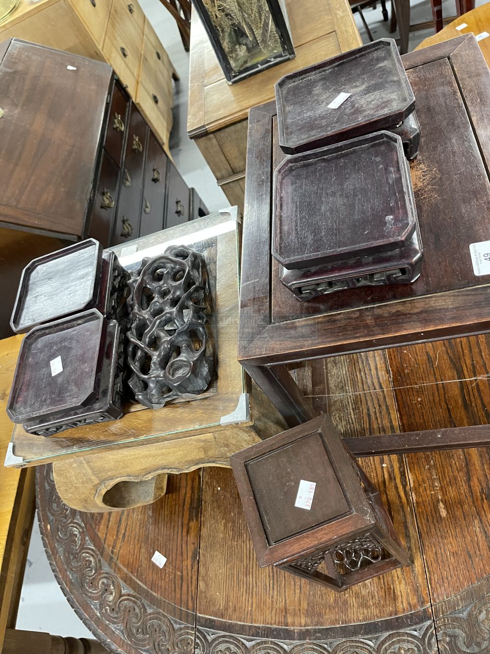 Early 20th cent. Chinese hardwood stands, set of four, single stand 13ins, simulated root stand,