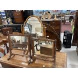 19th cent. Mahogany dressing table mirrors of delicate form (3).