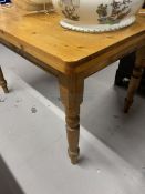 20th cent. Pine kitchen table with one central drawer, on turned supports. 47ins. x 31½ins.