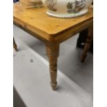20th cent. Pine kitchen table with one central drawer, on turned supports. 47ins. x 31½ins.