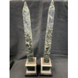 19th cent. Obelisk, multicolour marble on a black base, a pair. Height 16ins.