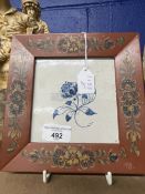 18th cent. Delft tiles, possibly Friesland, blue floral pattern, in later frames, a pair. 5½ins. x