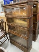 Early 20th cent. Oak Globe-Wernicke glazed sectional bookcase with four opening compartments, the
