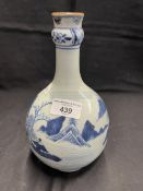 Qing dynasty garlic mouthed bottle vase decorated with pagodas by a lake. H9ins.