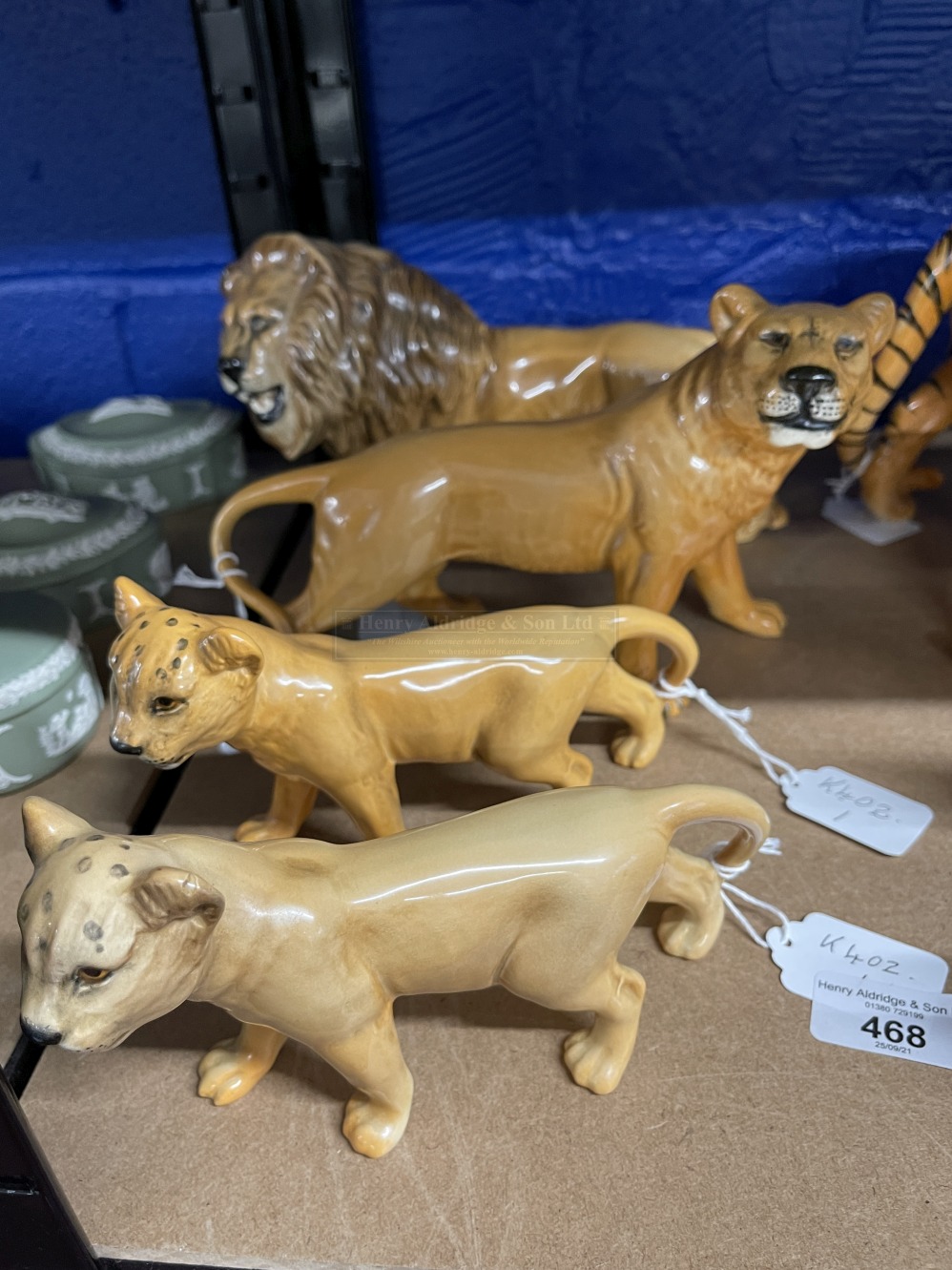 20th cent. Ceramics: Beswick Lion No 2089, Lioness No 2097 and 2 cubs No 2098. (4).