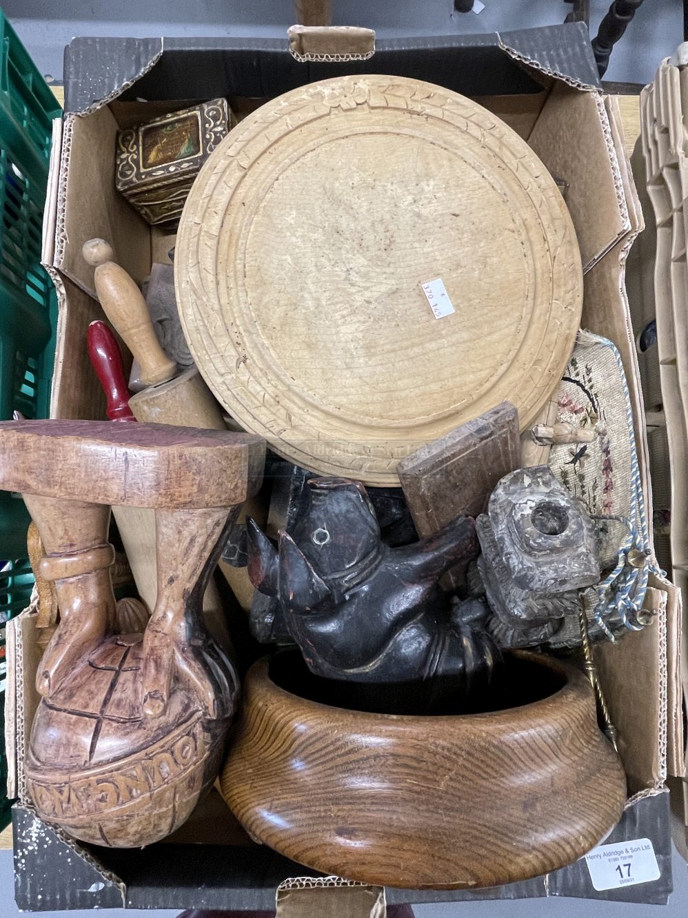 Treen carved figures, bread board, carved pig, rolling pins, boxes, cribbage board, a pair of