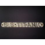 R.M.S. TITANIC: Extremely rare cast bronze painted lifeboat plaque "S.S. Titanic". It is unknown
