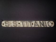 R.M.S. TITANIC: Extremely rare cast bronze painted lifeboat plaque "S.S. Titanic". It is unknown