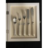 WHITE STAR LINE: Five piece set of White Star Line flatware, the knives and forks with reeded