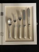 WHITE STAR LINE: Five piece set of White Star Line flatware, the knives and forks with reeded