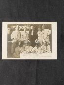 R.M.S. TITANIC: J.W. Barker 'Pierrot party aboard the Carpathia' real photo postcard, trimmed with