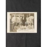 R.M.S. TITANIC: J.W. Barker 'Pierrot party aboard the Carpathia' real photo postcard, trimmed with