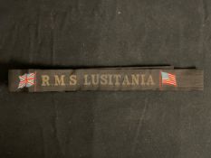 R.M.S. LUSITANIA: Gala night souvenir ribbon in black silk, depicting the ship's name between the