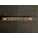 R.M.S. LUSITANIA: Gala night souvenir ribbon in black silk, depicting the ship's name between the