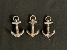 OCEAN LINER: Three white metal anchor brooches for the Cunard/White Star Line's R.M.S. Queen Mary,