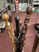 Walking Sticks: Collection of six sticks, four made from dense African hardwoods with terminals in