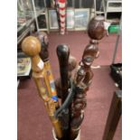 Walking Sticks: Collection of six sticks, four made from dense African hardwoods with terminals in