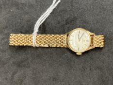 Watches: Ladies 9ct yellow gold Omega bracelet watch, silver coloured dial, mechanical movement,