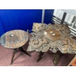 20th cent. Hardwood carved tables, one African depicting local fauna. 16ins. x 13ins. Dia. The other