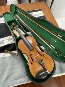 Musical Instruments: Late 19th/early 20th cent. German violin with two bows stamped to back