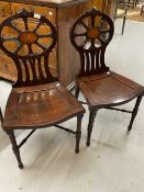 Late 18th cent. Mahogany hall chairs, the pierced shaped backs with central panels of satinwood, the