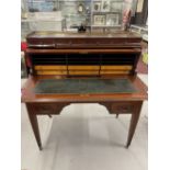 Late 19th cent. Mahogany cylinder top desk having original brass gallery to mahogany top above