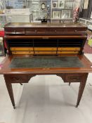 Late 19th cent. Mahogany cylinder top desk having original brass gallery to mahogany top above