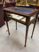 Early 20th cent. Mahogany and inlaid Bijouterie display cabinet on tapering spade supports. 25ins. x