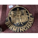 Birmingham Fire Insurance wall plaque, cat with a fireman before a fire cart. 10½ins.