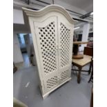 Early 20th cent. French pine wine cabinet with lattice doors and later addition of Shabby Chic