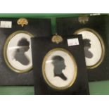 18th cent. Silhouettes of women in papier mache frames, one bears an old collection label on the