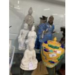 Chinese Blanc de Chine porcelain figures, Buddha seated in a Lotus posture, Guanjin standing