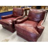 Pre-war red leather club chairs in the style of Howard & Co. Re upholstered in traditional wine