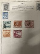 Stamps: Mid 20th cent. Schoolgirl Triumph stamp album of GB and World issues.