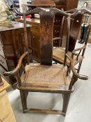 China/Far East: 19th/20th cent. Hardwood yoke back carver chairs with rattan seats. (2)