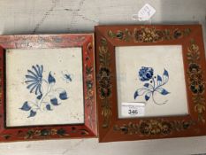 18th cent. Delft tiles, possibly Friesland, blue floral pattern, in later frames, a pair. 5½ins. x