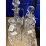 Crystal Glass Decanters: 20th cent. One ewer shaped, a pair with mushroom stoppers, plus one more,