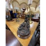 Lighting: Selection of five lamps. Two figural young women with geese, grandfather reading to