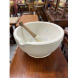 Early 20th Stoneware mortar and pestle, impressed 12 to base. Dia. 13ins. Height 7ins.