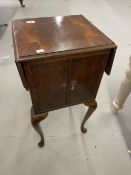 20th cent. Mahogany pot cupboard side table with drop leaves on cabriole supports. 25ins. (Extended)