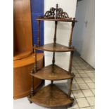 Late 19th cent. Walnut inlaid four tier what not with fretwork top. 49ins.