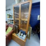 20th cent. 1970s G plan teak furniture, glazed bookcase over two door cupboard. 32ins. x 18ins. x