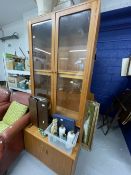 20th cent. 1970s G plan teak furniture, glazed bookcase over two door cupboard. 32ins. x 18ins. x