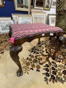 Early 20th cent. Mahogany stool, the shaped top rail above cabriole legs with shell carving and