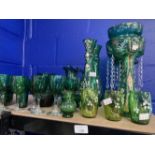 Late 19th/early 20th cent. Green glass decorated with enamel flower lustre 14ins, tapering vases