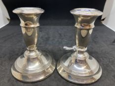 Hallmarked Silver: Pair of filled candlesticks with reed pattern, hallmarked Birmingham 1925. 3¾ins.