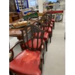 19th cent. Sheraton style mahogany shield back dining chairs, six singles, one carver, on tapered