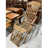 20th cent. Teak folding 'steamer' chair, unmarked back. Height opened. 35ins.