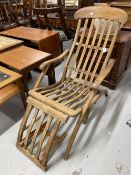 20th cent. Teak folding 'steamer' chair, unmarked back. Height opened. 35ins.