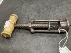 19th cent. Corkscrew in the manner of Thomason, two pillar with bone handle signed. 9½ins. Extended.